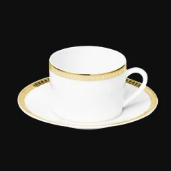 Tasse à thé avec soucoupe en porcelaine finition or