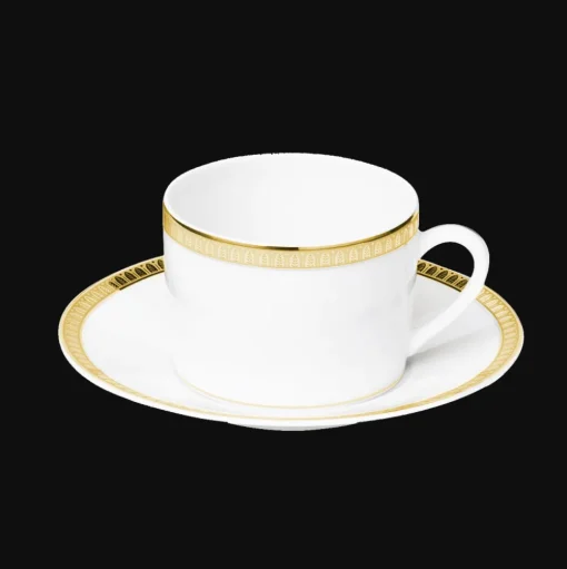 Tasse à thé avec soucoupe en porcelaine finition or